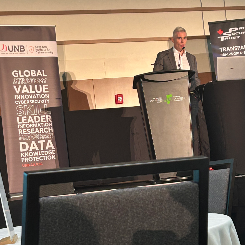 Paul Hanley, Senior Vice President of Cyber Security at Rogers Communications, delivering insights on emerging cyber threats at the #PST2025 Industry Summit.